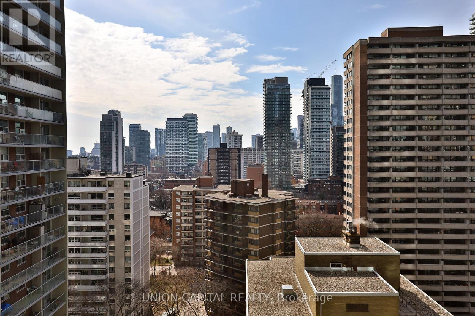 A view of a cityscape from a high-rise building.