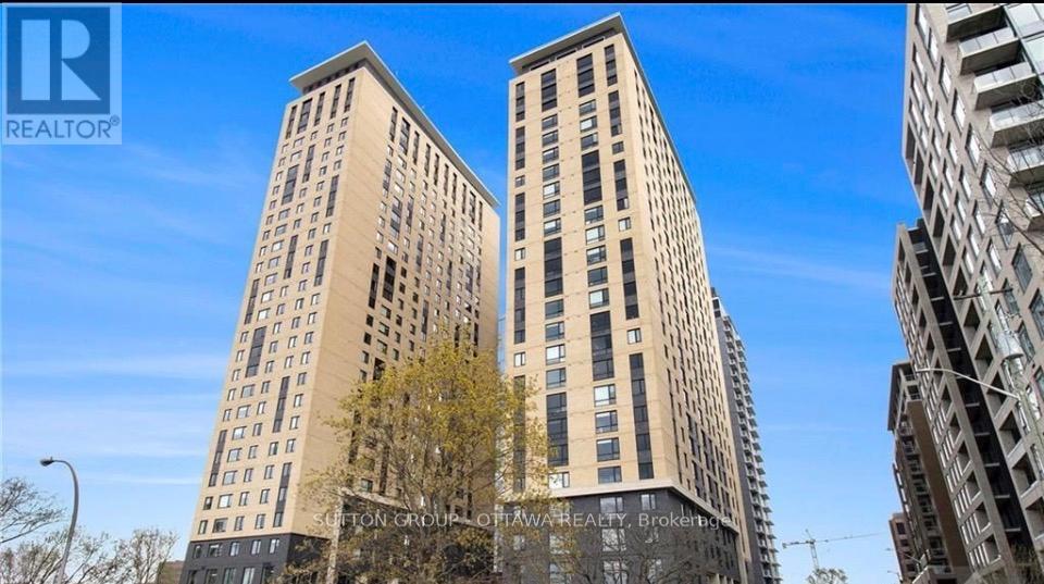 Two tall buildings with the words "Sutton Group of Realty Brokerage" on them.