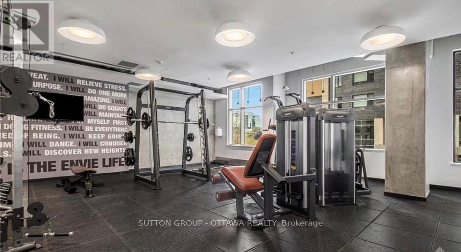 A gym with a variety of equipment including a squat rack, bench, and weights.