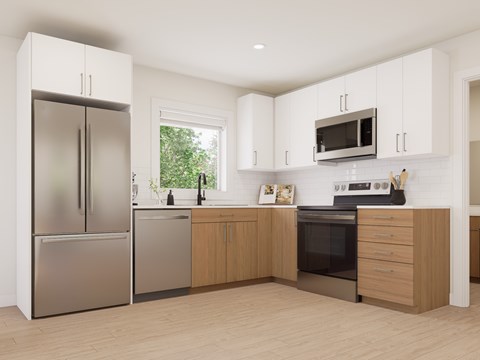 A modern kitchen with wooden cabinets and stainless steel appliances.