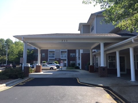The entrance to a building with the number 311 on it.