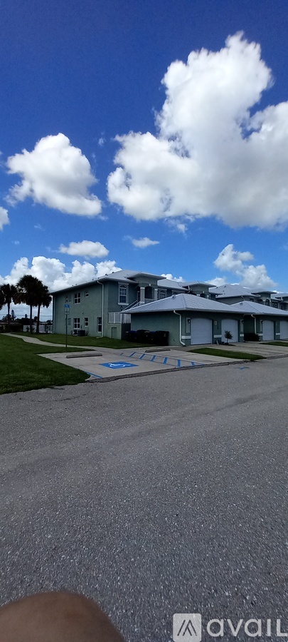 A cloudy sky over a residential area.