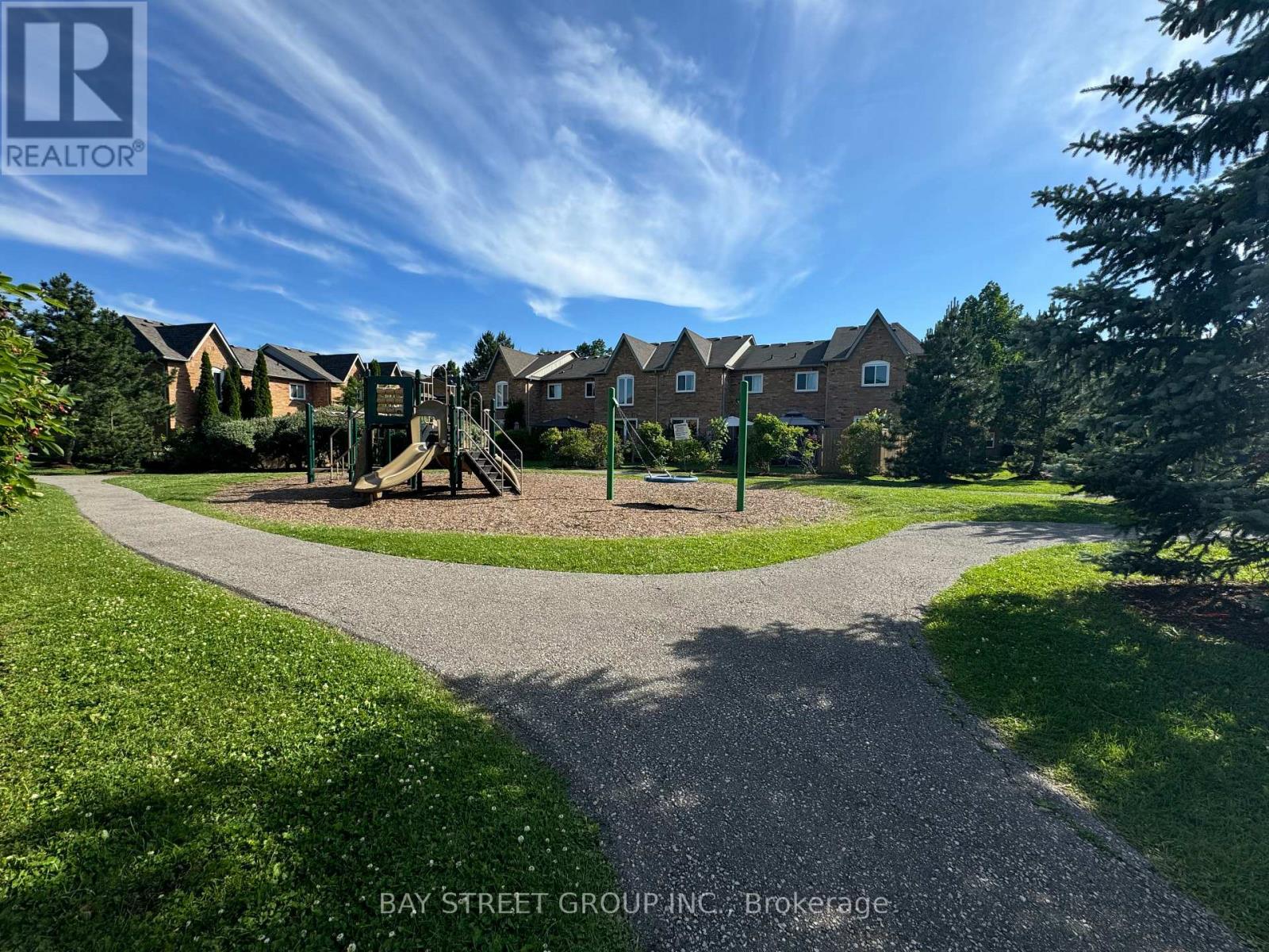 A residential area with houses and a playground.