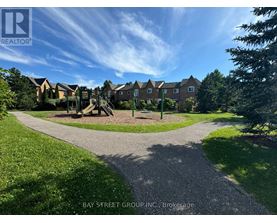 A residential area with houses and a playground.