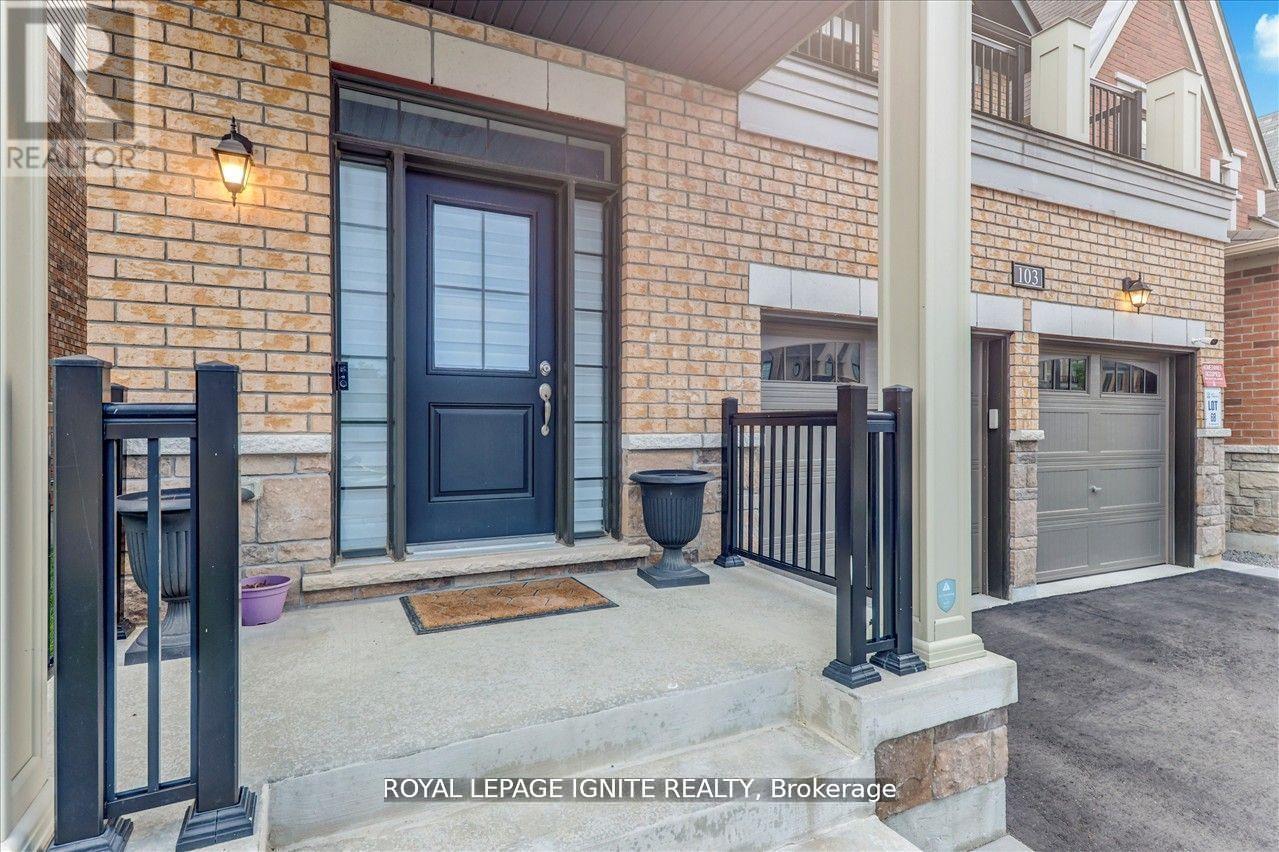 A house entrance with a black door and a sign that says "REALTOR".
