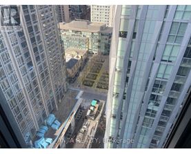 A view from a high-rise building looking down at a construction site.