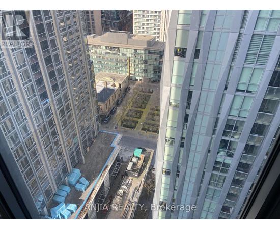 A view from a high-rise building looking down at a construction site.