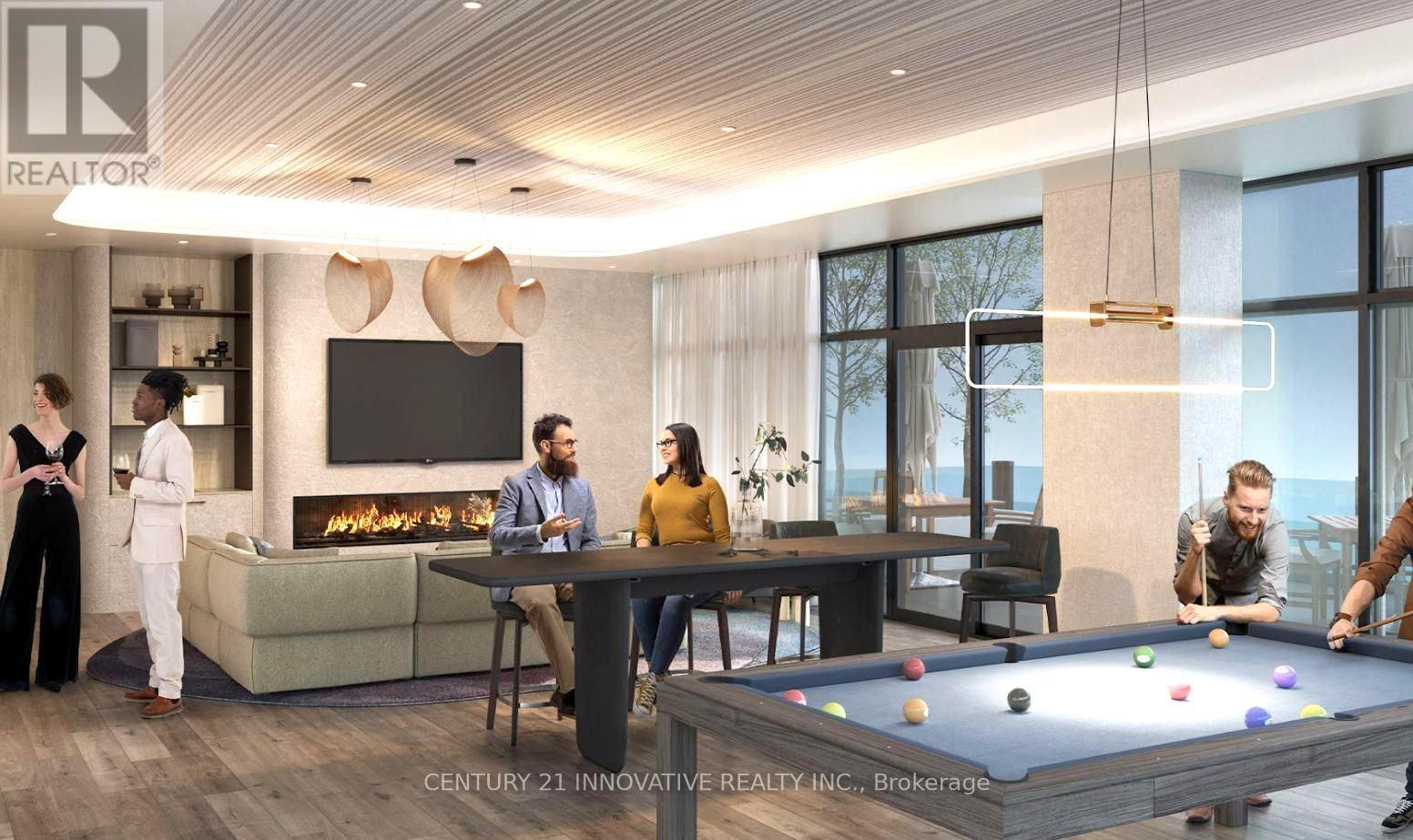 A group of people are gathered in a modern living room with a pool table.
