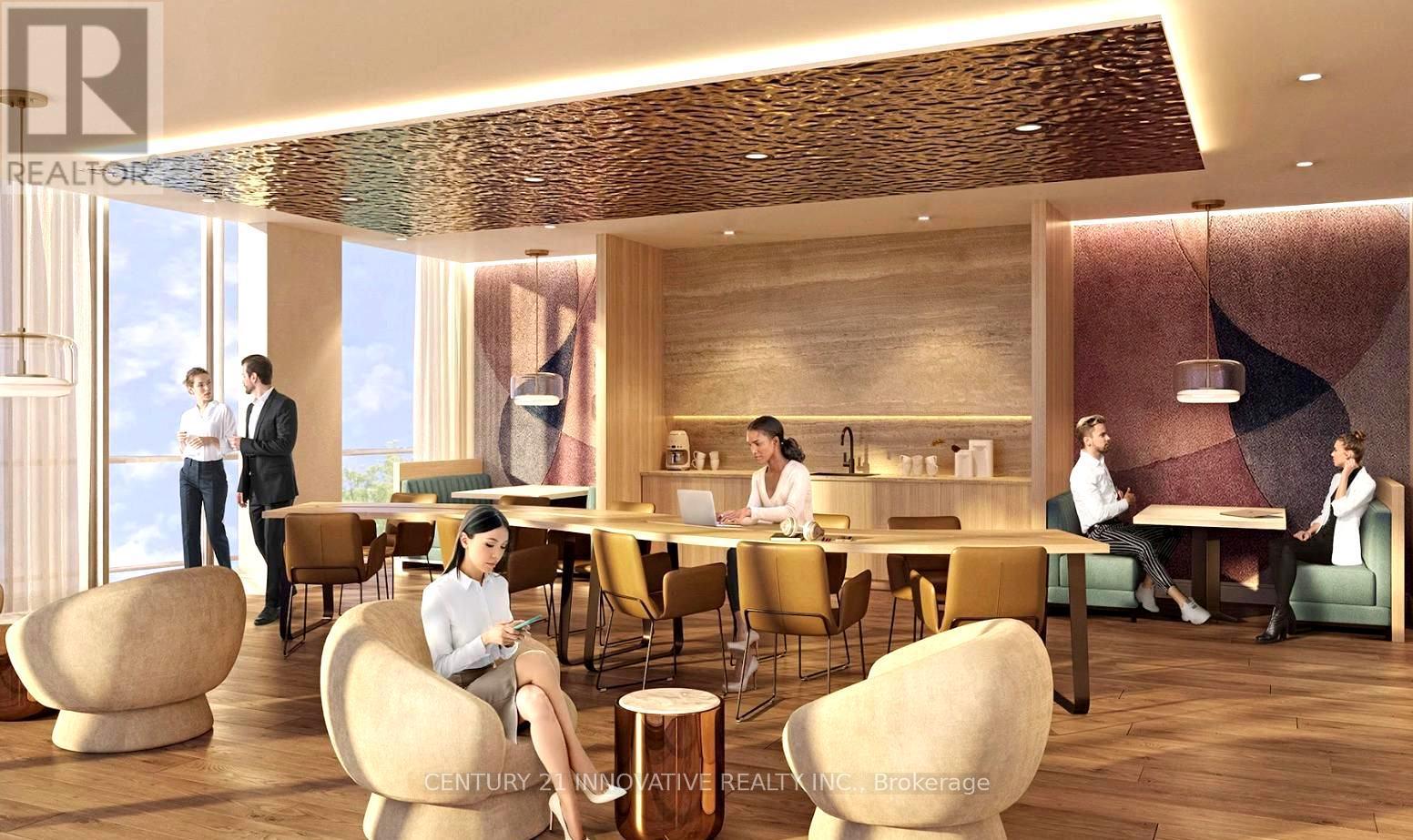 A modern dining area with people sitting and standing around tables.