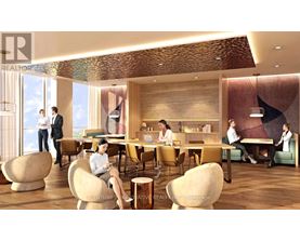 A modern dining area with people sitting and standing around tables.