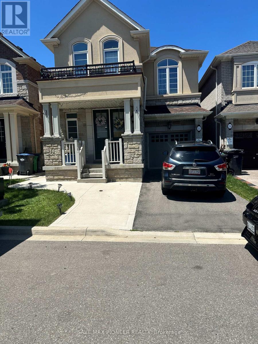 A house with a car parked in front of it.