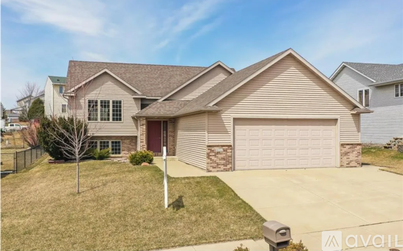 A house with a garage is available for sale.