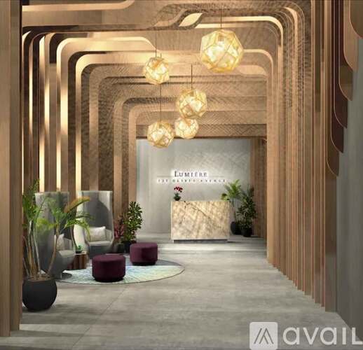 A modern interior space with wooden columns and hanging light fixtures.