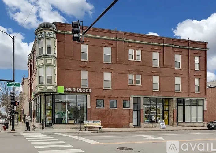 A street view of a building with the sign H&R Block.