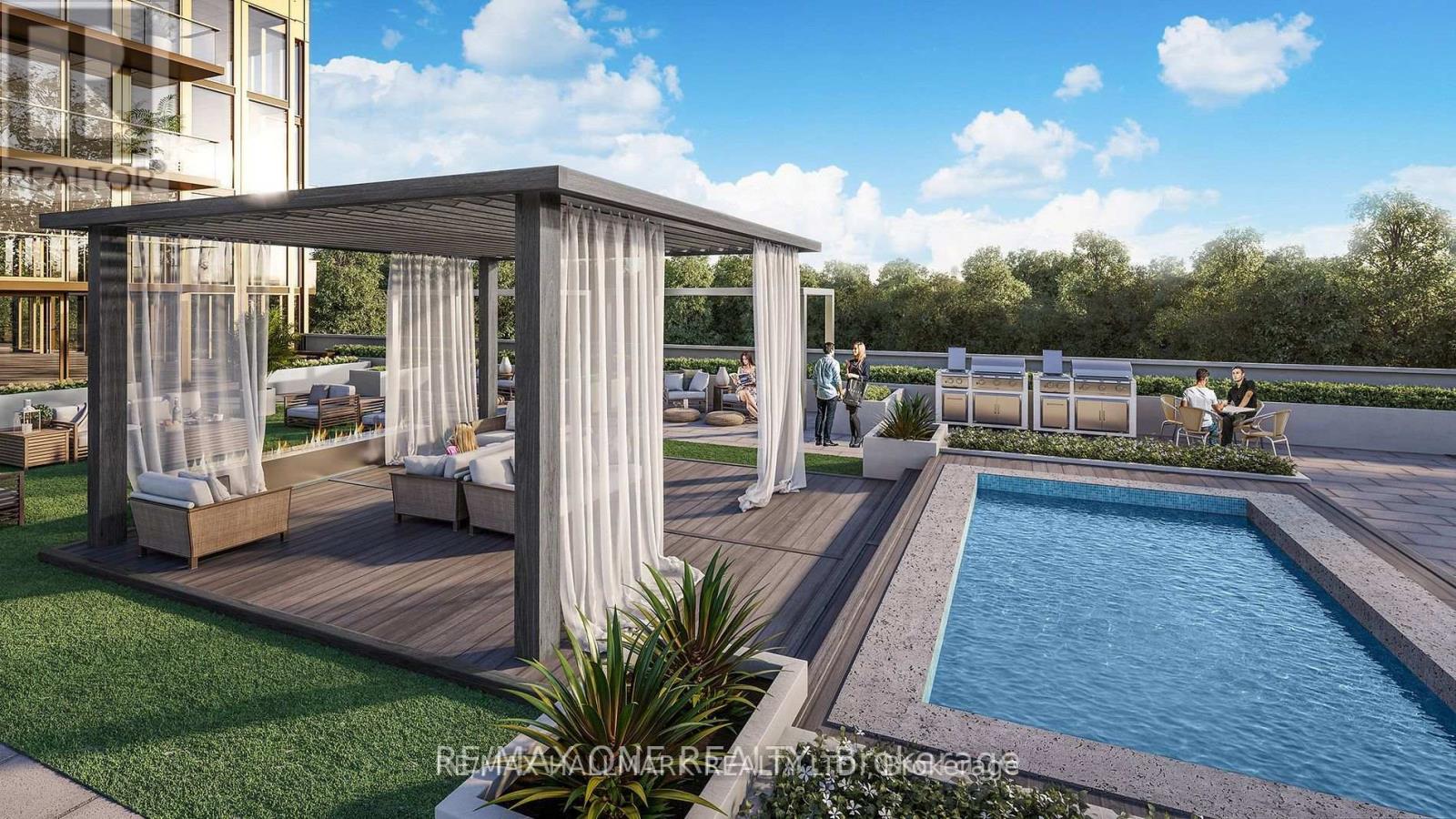 A modern outdoor pool area with a pergola and lounging areas.