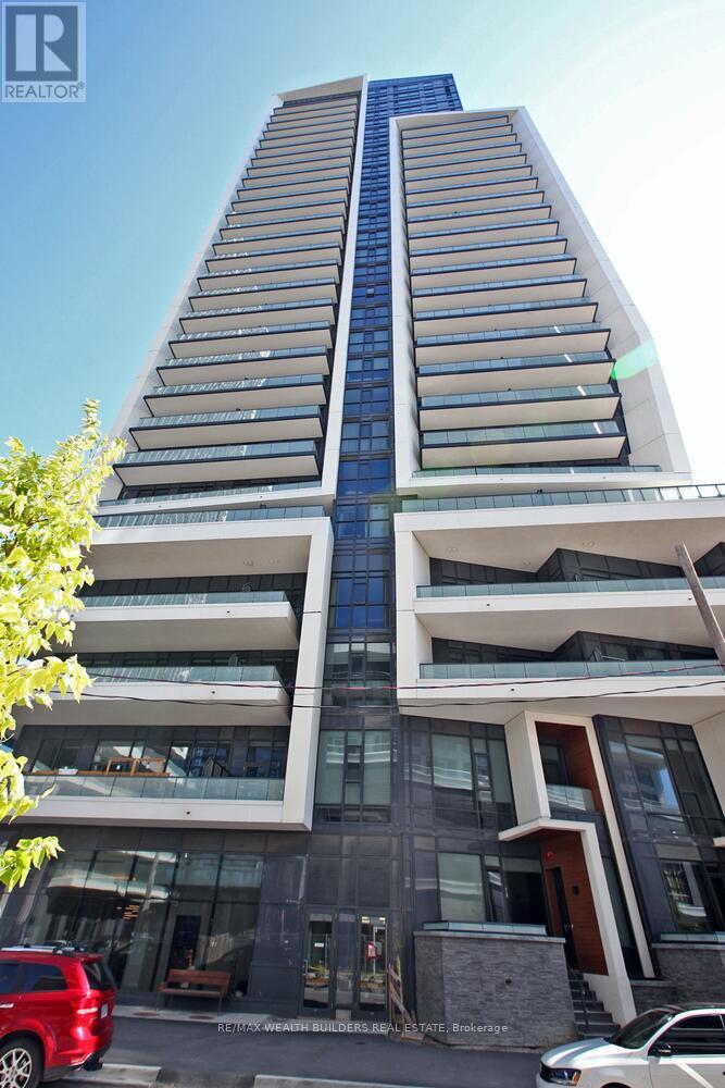 A tall building with a blue sky in the background.