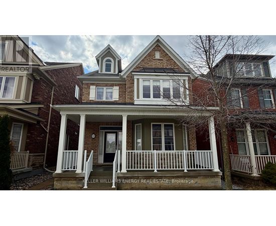 A house with a porch and a sign that says "REALTOR".