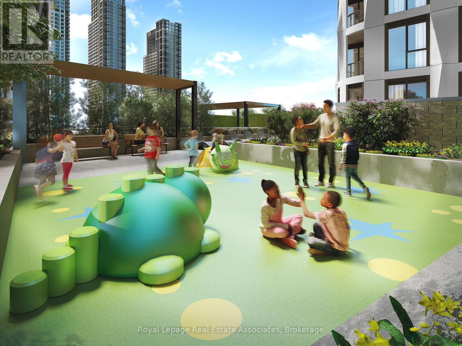 A playground with a green slide and children playing.