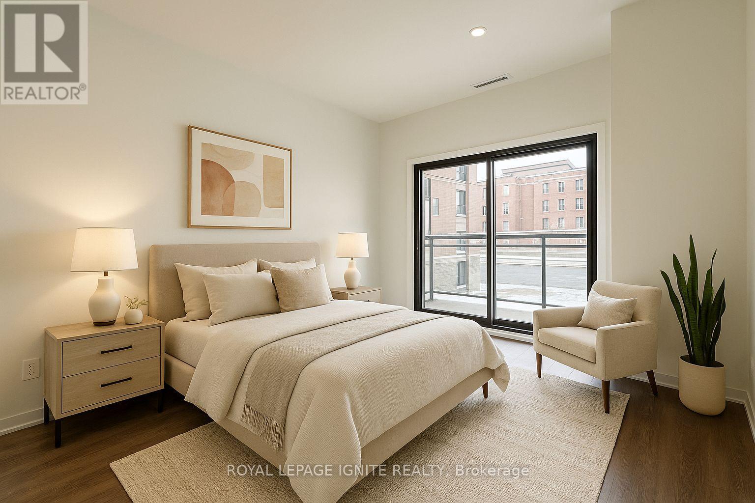 A bedroom with a large bed, a chair, and a plant.