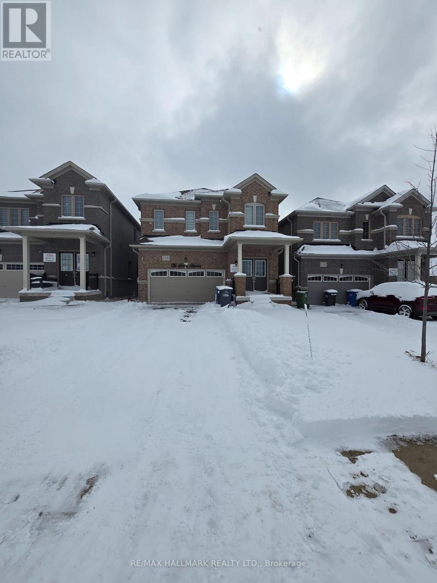 A snowy scene with a house and a car in the foreground.