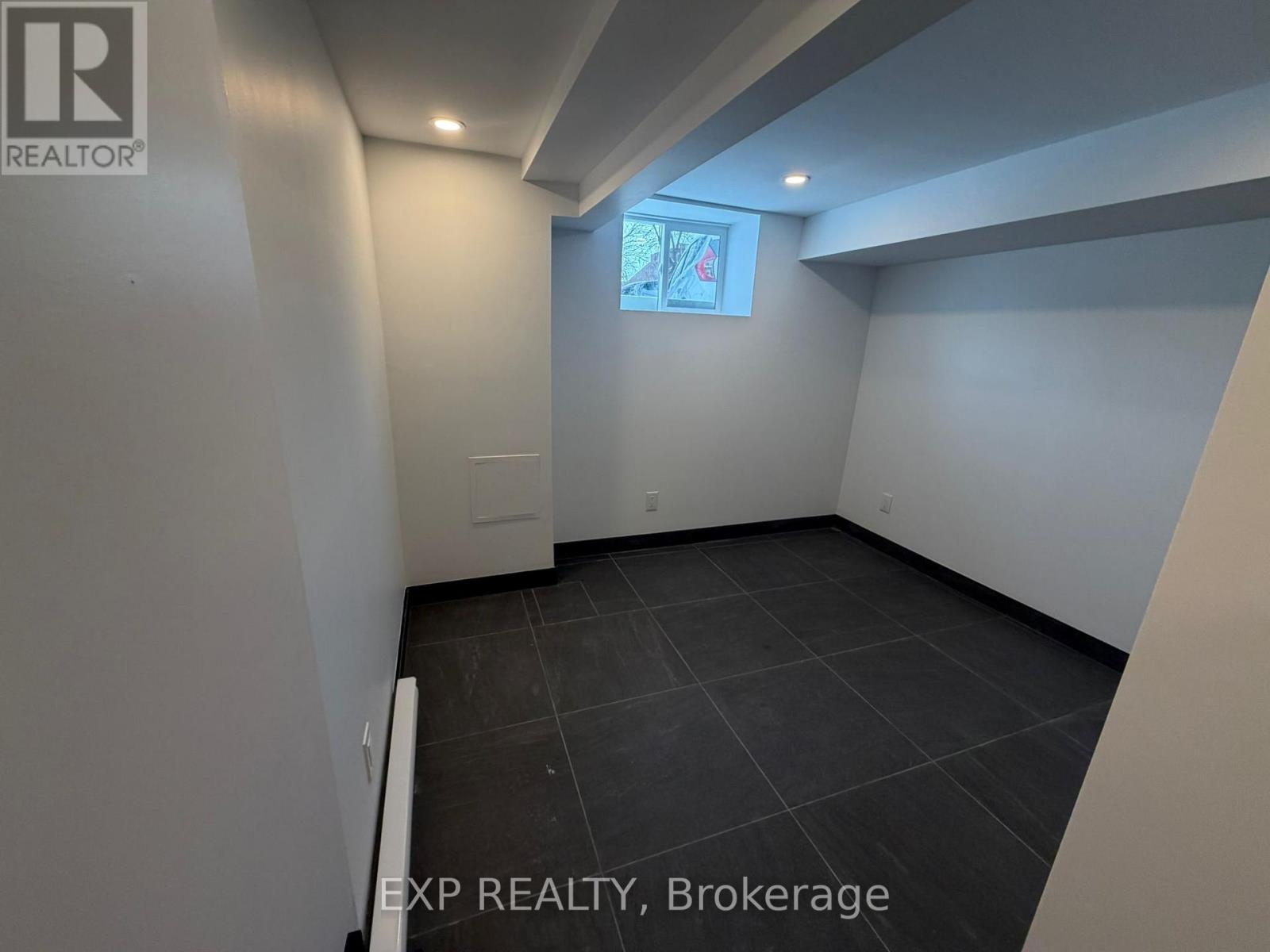A room with EXP REALTY, Brokerage watermark on the floor.