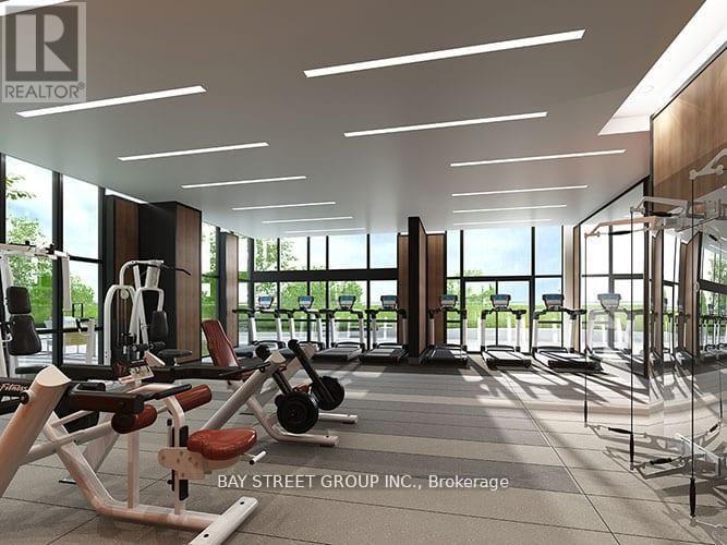 A gym with a variety of equipment is part of the Bay Street Group Inc. in Brokerage.