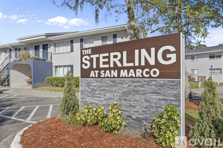 The Sterling at San Marco is a residential building with a sign in front.