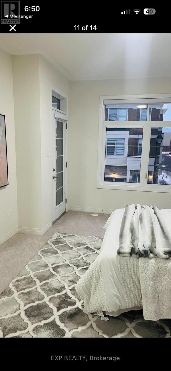 A bedroom with a bed and a window.