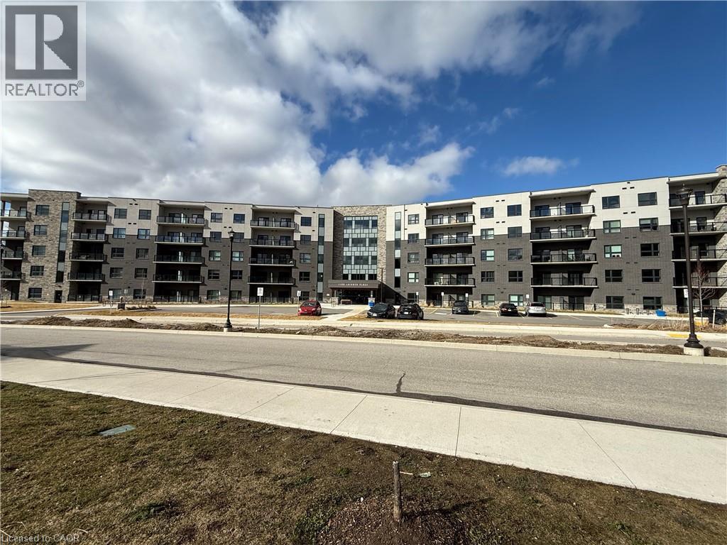 A large apartment complex with a REALTOR® logo in the corner.