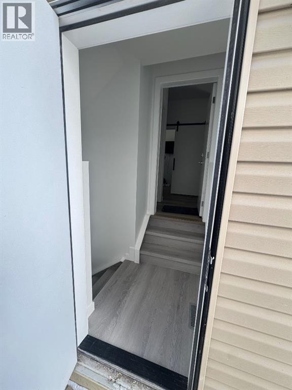 A realtor's photo of a house's exterior entrance.