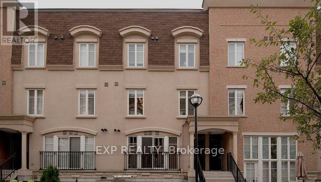 A building with the words EXP REALTY Brokerage on the front.