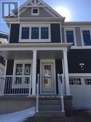 A house with a porch and a white door.