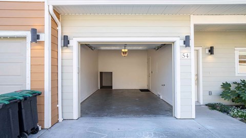 A garage with the number 54 on the door.
