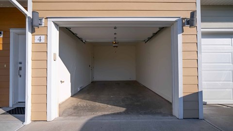 A garage with the number 4 on the wall.