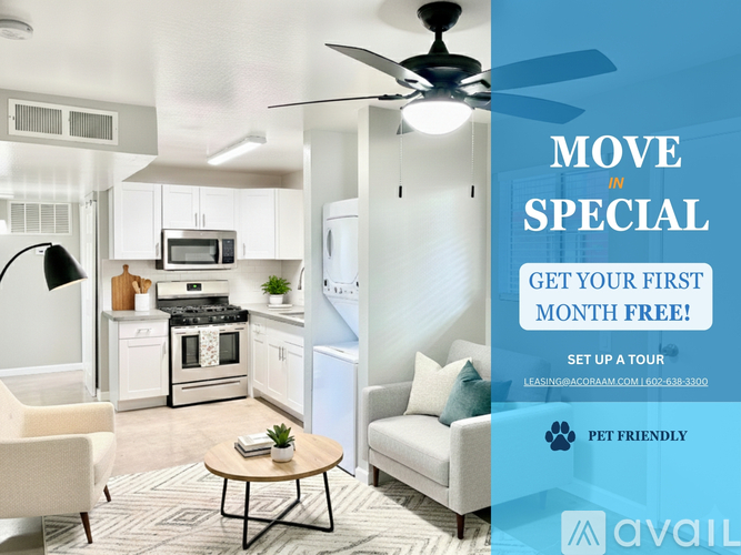A living room with a kitchen in the background and a sign advertising a free first month for a move in special.