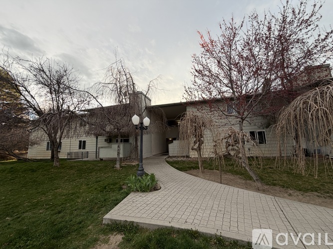 A building with a walkway in front of it.