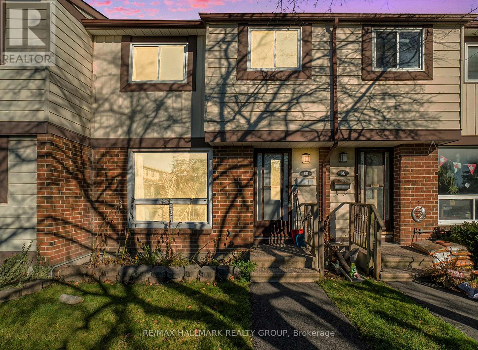 A house with a REALTOR sign on the front.