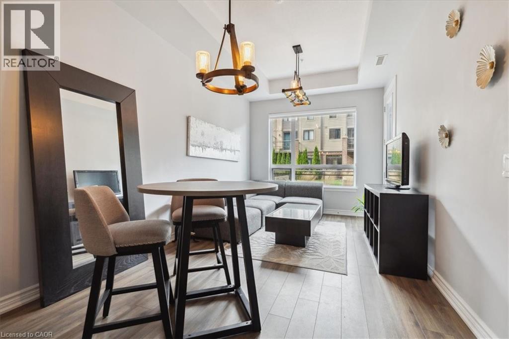 A modern dining room with a table and chairs.