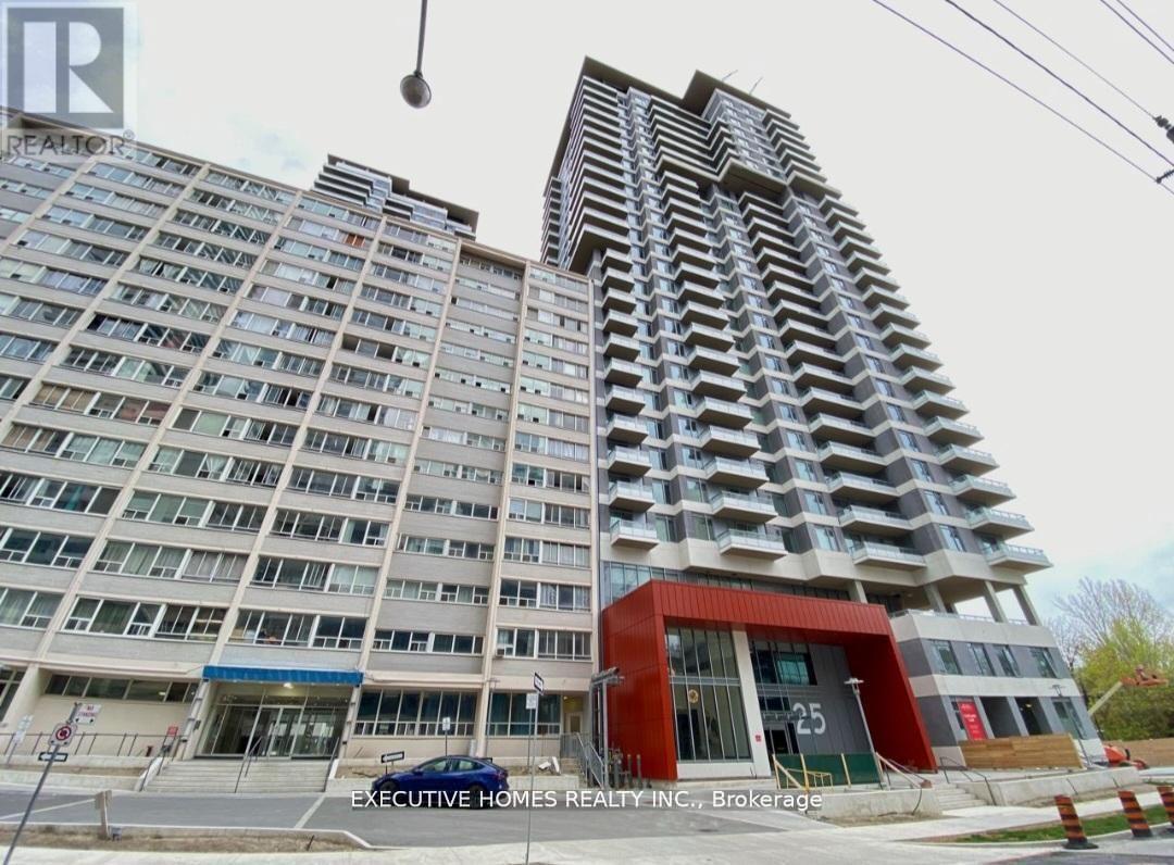 A building with a red entrance and a sign that says Executive Homes Realty, Brokerage.