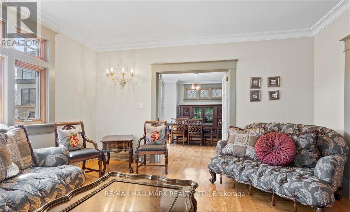 A living room with a grey sofa and a coffee table.