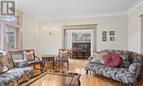 A living room with a grey sofa and a coffee table.
