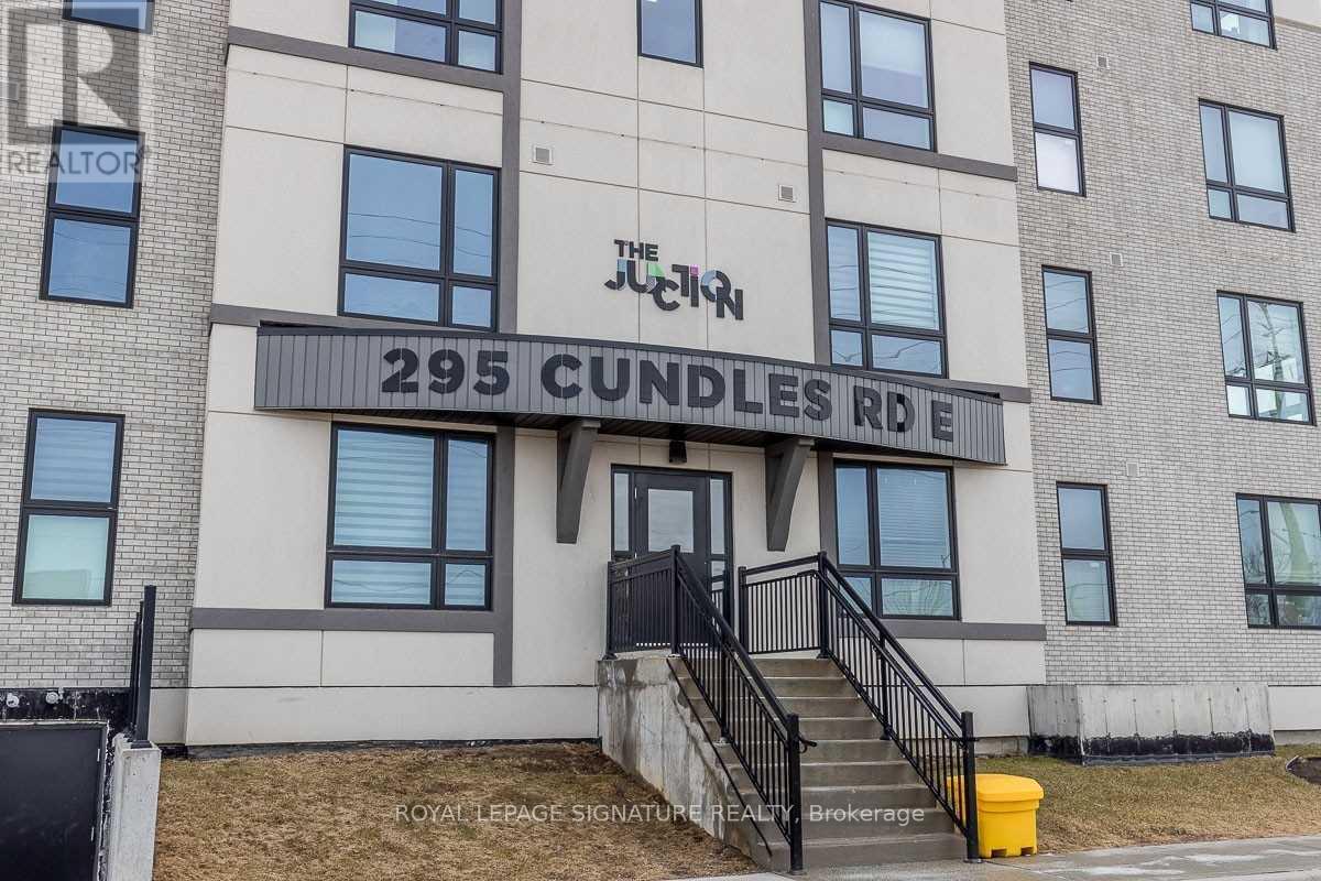 The exterior of a building with the sign "The Junction" and the address "295 Cundles Rd" is shown.