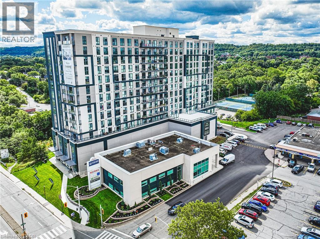 A large building with a parking lot in front of it.