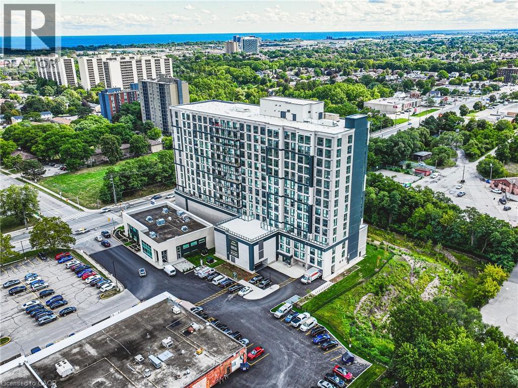 A large building with a parking lot in front of it.