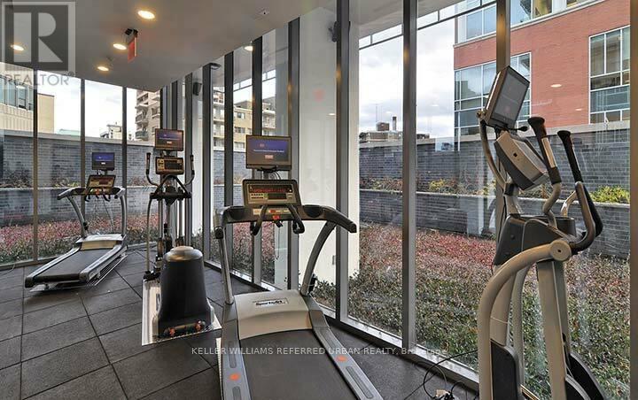 A gym with treadmills and exercise bikes.