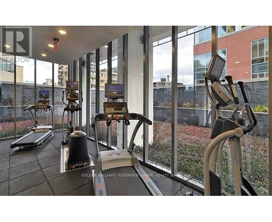 A gym with treadmills and exercise bikes.