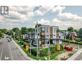 A modern apartment building is located on Champlain Street.