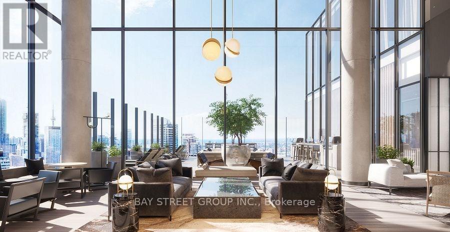 A modern living room with a view of the city skyline.