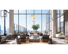 A modern living room with a view of the city skyline.