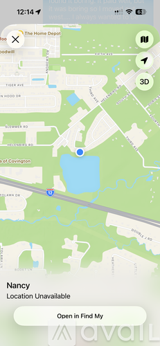 A map application is open on a phone screen, showing a location marked with a blue pin.